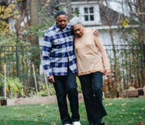 Couple walking outside.