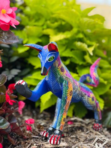 An alebrije animal painted in bright colors