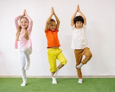 Children in yoga poses
