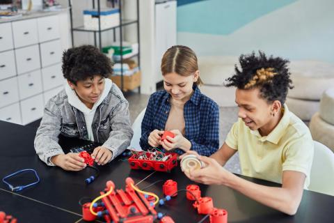 Kids exploring circuits.