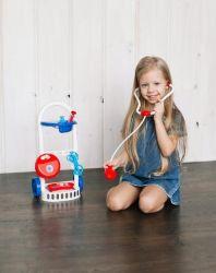 Girl Pretending with Toy Stethoscope