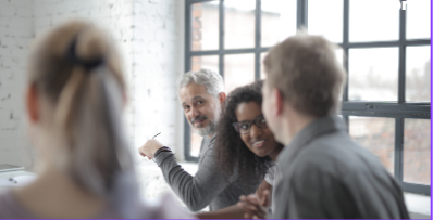 four people having a conversation