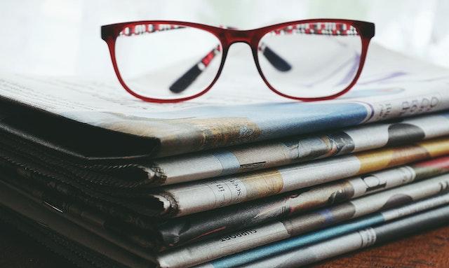 Eyeglasses on Newspapers