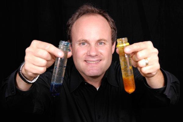 Photo of Steve Belliveau holding test tubes