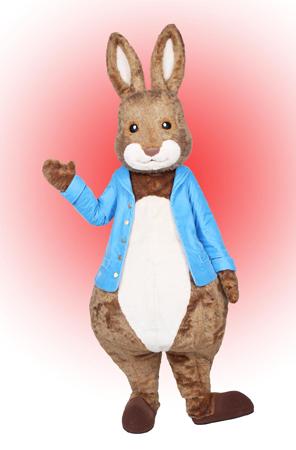 Peter Rabbit. A brown rabbit wearing a blue coat.